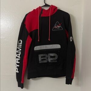 USED- Chris Brown Brand, Black Pyramid, Black and Red Hoodie with Logo Size: M